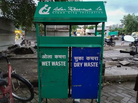 Separate garbage waste bins for dry and wet waste roadside in city, India Stock Photos