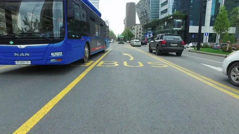 Separate lane for buses on the road. Public transport lane Stock Footage 166344994