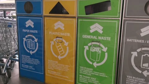 Separate Paper Waste and Plastic Waste Garbage Can Stock Footage 203172391