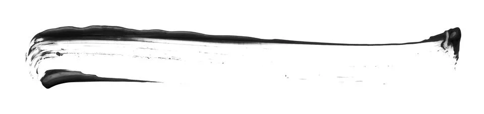 Separate torn black brush strokes on white background. Stock Photos