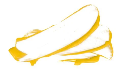 Separate torn yellow brush strokes on white background. Stock Photos