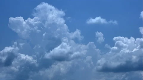 Separate white clouds on a blue background have real clouds. Stock Footage 152755557
