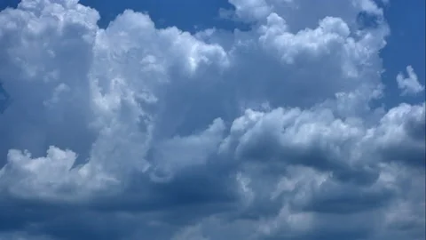 Separate white clouds on a blue background have real clouds. Video stock 152755761