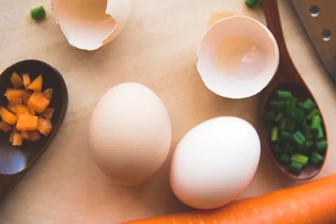 Separated egg white with Scallion and carrot Stock Photos