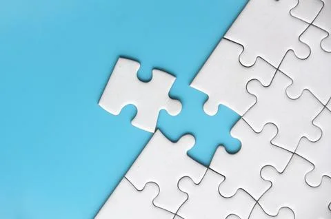 Separated jigsaw puzzle with customizable space for text. Copy space with b.. Stock Photos