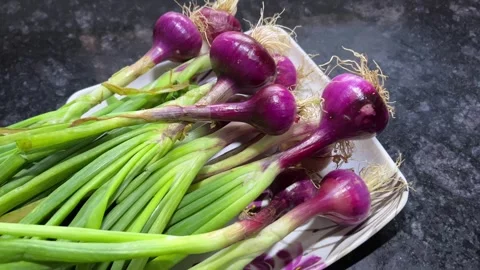 Separated by Pipe): Close-Up of Freshly Chopped Green Onions in a White Plate Видео 319476127