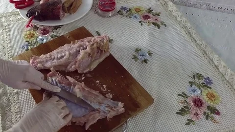 Separates the fish fillets from the skin. Stock Footage 77900436