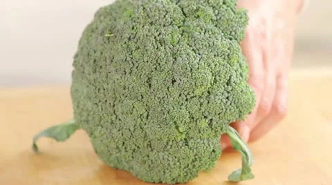 Separating broccoli florets Stock Footage 24664685