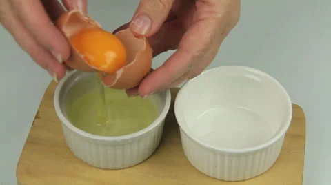 Separating An Egg Stock Footage 32519758