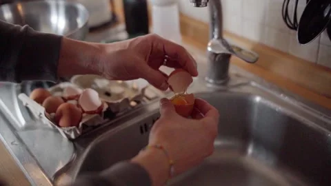 Separating Egg Yolk Stock Footage 282898050