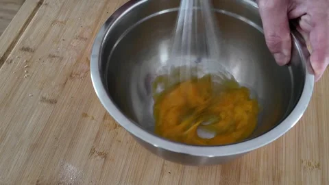 Separating Eggs and Beating Egg Yolks Stock-Footage 347907801