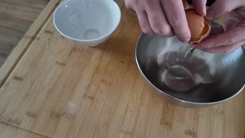 Separating Eggs and Beating Egg Yolks Stock-Footage 347907839
