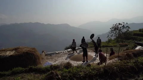 Separating paddy from wastes in Mountain Stock Footage 270865360