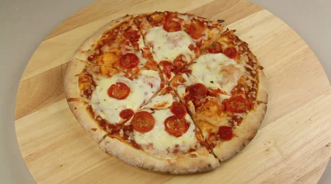 Separating Pizza Pieces On Board Stock Footage 36614147