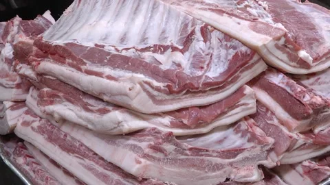 Separation of meat from bone. The division of meat into varieties Stock Footage 99421478