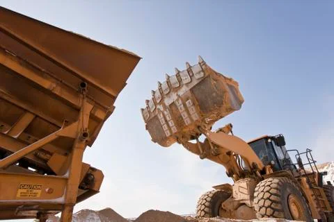 Separator and a front end loader at a construction site Stock Photos
