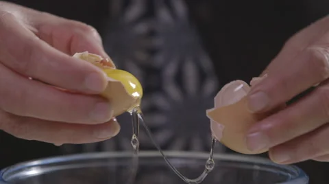 Seperating an egg close up Stock Footage 64026743