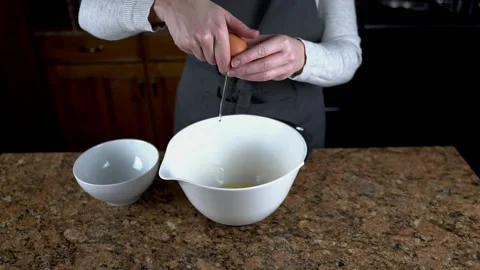 Seperating eggs slow motion Stock Footage 150278219