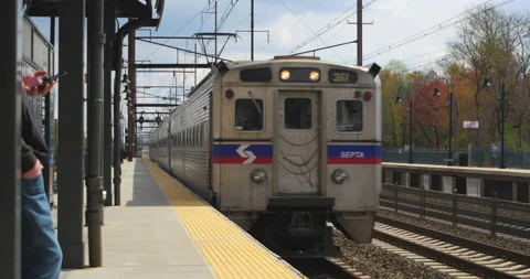 SEPTA train SB arriving Croydon, PA Stock Footage 133085751