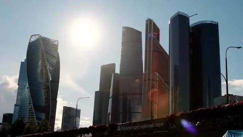 September 11, 2025, Moscow, Russia. Tall Buildings Stand Against a Bright Sun in Vidéo 326326853
