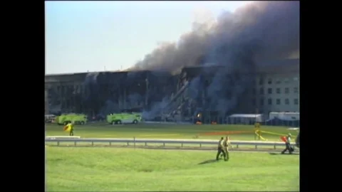 September 11 Fallout: Smoke Billows from the Pentagon After Attack Stock Footage 79703176