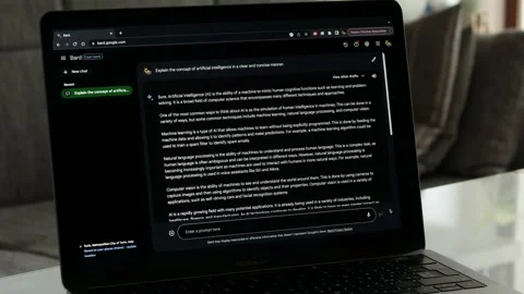 SEPTEMBER 14, 2023: Using Google Bard, Generative AI, on an Apple Macbook Pro Stock Footage 250260481