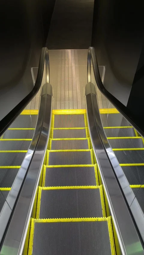 September 2 2026 vertical high resolution moving escalators Stock Footage 344450414