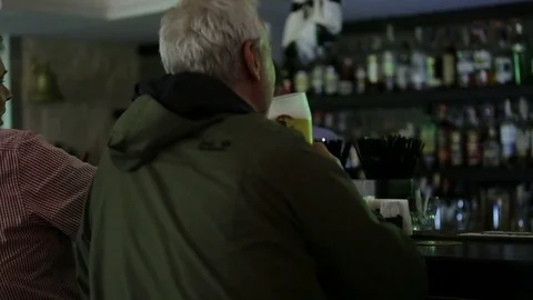 September 23, 2016 Dnepr, opening a new pub, people celebrate and watch football Stock Footage 70793049