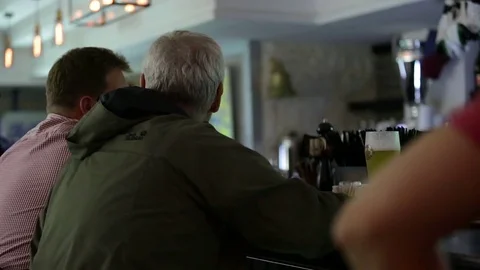 September 23, 2016 Dnepr, opening a new pub, people celebrate and watch football Stock Footage 70793111