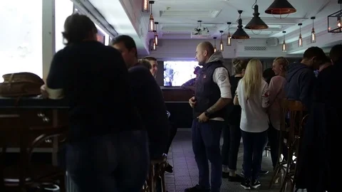 September 23, 2016 Dnepr, opening a new pub, people celebrate and watch football Stock Footage 70793534