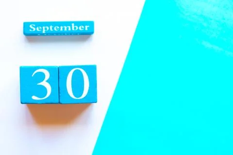 September 30, empty blue and white geometric background. Wooden handmade cale Stock Photos