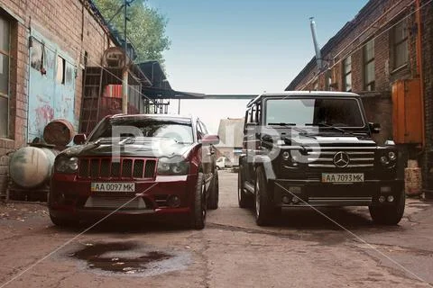 September 4, 2012, Kyiv. Mercedes-Benz G55 AMG and Jeep Grand Cherokee SRT8 Stock Photos