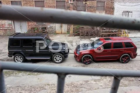 September 4, 2012, Kyiv. Mercedes-Benz G55 AMG and Jeep Grand Cherokee SRT8 Stock Photos