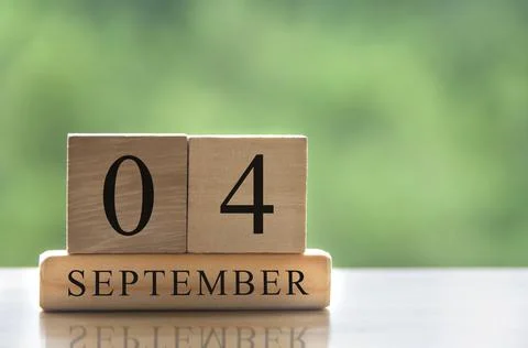 September 4 calendar date text on wooden blocks with copy space for ideas. Stock Photos