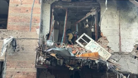 Sequels of the Russian attacks that left two dead persons in Zaporiyia, Ukraine, Video stock 339733456