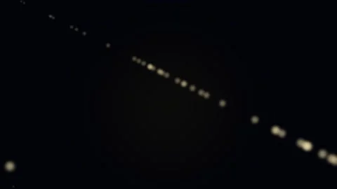 A sequence of bright starlink satellite lights captured in the night sky Stock Footage 338310568