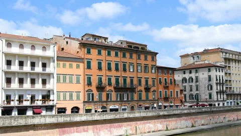 Sequence of buildings on Arno river in Pisa Stock Footage 133588626