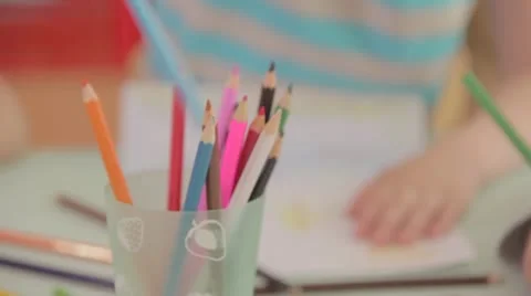 Sequence: childern drawing with coloured pencils Stock Footage 12710852