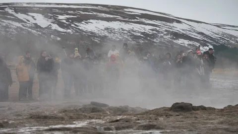 Sequence: Close Up Of Visitors Watching Geysir Erupt in Iceland Stock Footage 96747958