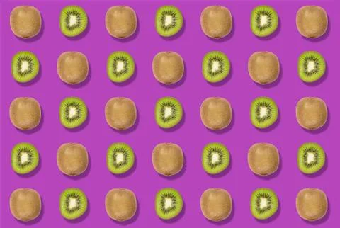 Sequence of a colorful pattern of cut and whole kiwis on a purple background. Stock Photos