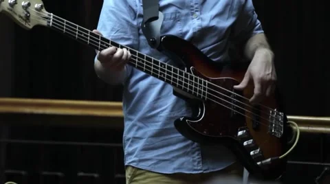 Sequence of a concert. A boy plays the guitar, showing their mastery Stock Footage 59681964