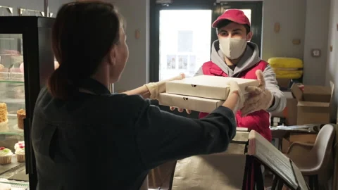 Sequence of Courier Picking Up Order and Making Delivery Video stock 136643123