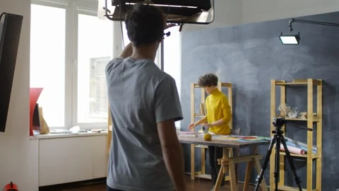 Sequence of Designer and Vlogger Making Collage Stock-Footage 111551223