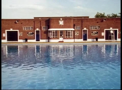 Sequence of empty water park area with pools and diving boards Stock Footage 159723723