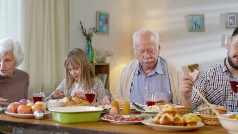 Sequence of Family Enjoying Easter Dinner Stock Footage 106591873
