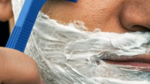 Sequence of few shots man shaving with different manual razors and foam Stock Footage 102119915