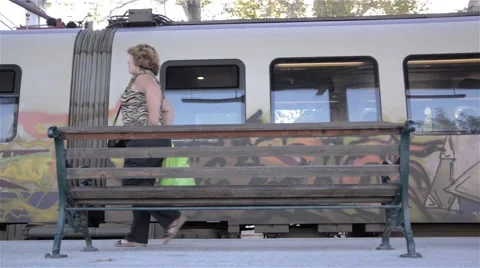 Sequence filmed railway station, while a stationary passenger train headed  Stock Footage 59842493