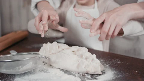 Sequence Of Kneading Bread Dough Together 動画素材 145458884