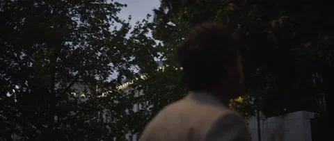 Sequence of Man walking through downtown 1 Stockbeeldmateriaal 135466905