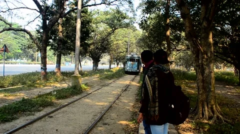 Sequence of moving trum and waiting Indian  couple Stock-Footage 39984931